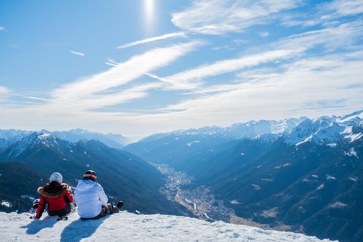 beautiful-shot-two-persons-enjoying-view-mountains-valley
